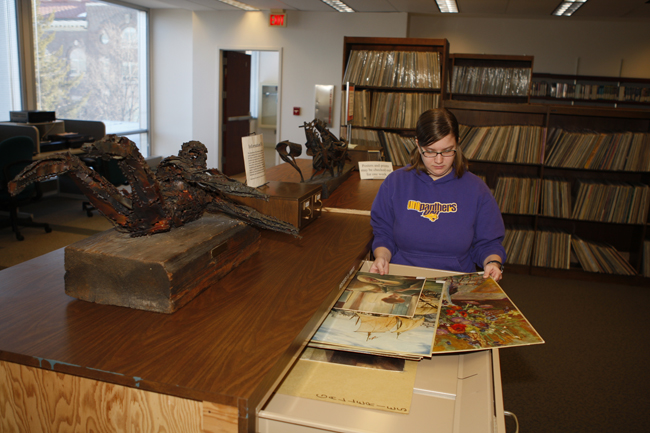 student working in the library